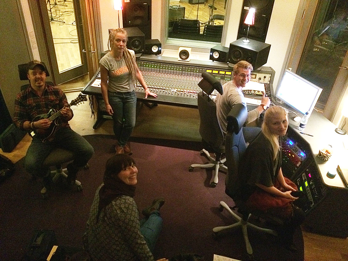 Members from Downhill Bluegrass Band in the studio with Good Harvest