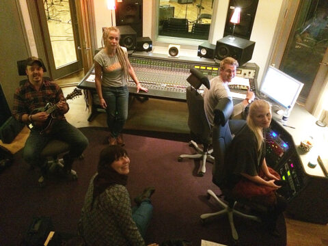 Members from Downhill Bluegrass Band in the studio with Good Harvest